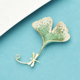 broche libellule ginko radieux fond bleu