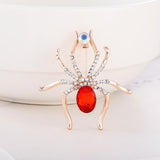 broche araignée verre et diamant rouge