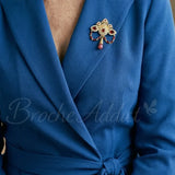 broche-ancienne-rouge-doree-vetement-zoom