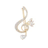 Broche originale note musicale dorée