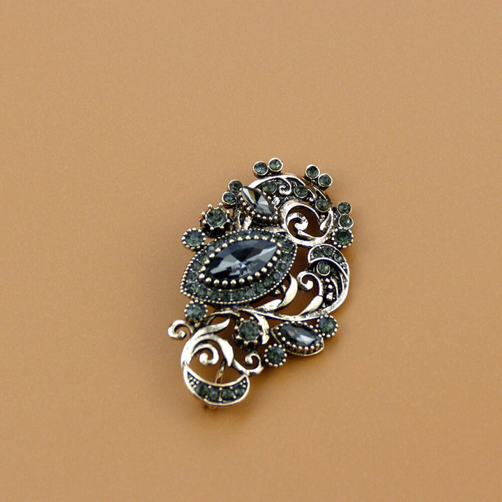 Broche Ancienne Elixir
