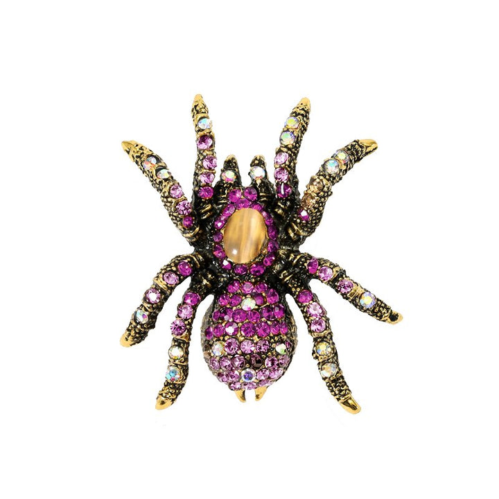 Broche araignée fuchsia