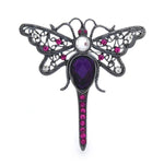 broche libellule violette cosmique