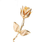 broche rose or