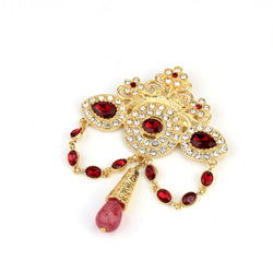 broche ancienne rouge et dorée
