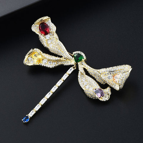 Broche libellule en or jaune 18K 750 millièmes et argent Broche libellule en or jaune 18K 750 millièmes et argent